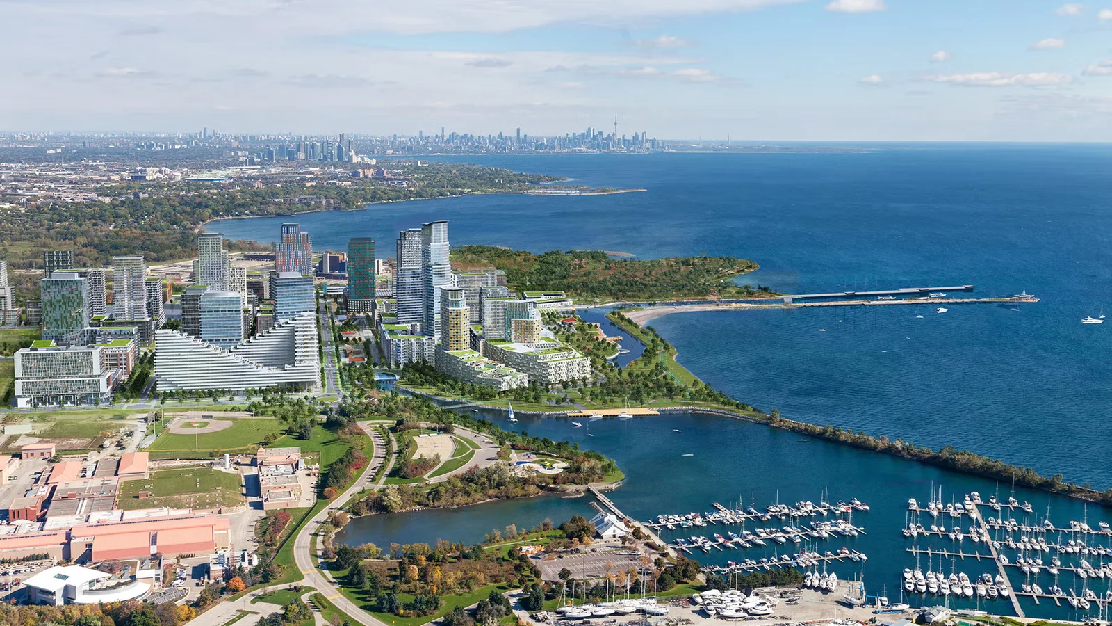 Aerial concept of Lakeview Village showing neighbourhoods, green spaces and the Lake Ontario shoreline.